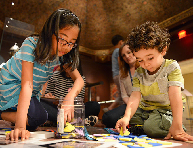 Children playing with art supplies.